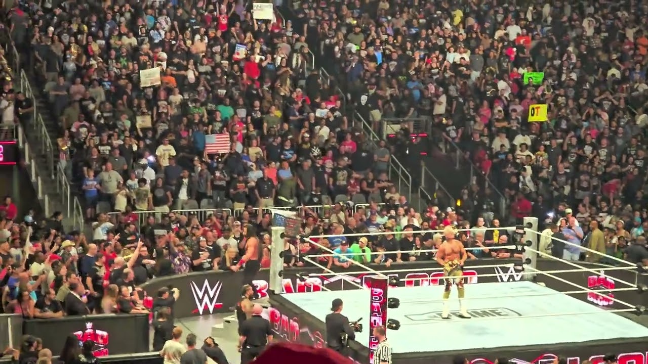 THE ROCK SHOWS UP TO CONFRONT ROMAN REIGNS AND CODY RHODES AT BADD BLOOD FULL LIVE REACTION
