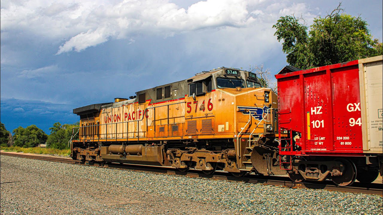 UP 5860 leads a SB Herzog through Fountain, CO. With a fun unit pushing on the rear