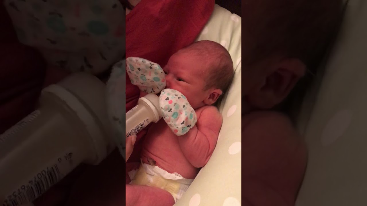 Newborn tries formula after breast feeding