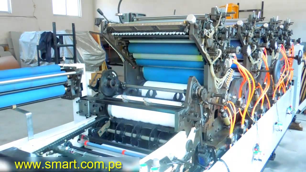 OFFSET MACHINE FOUR COLOR