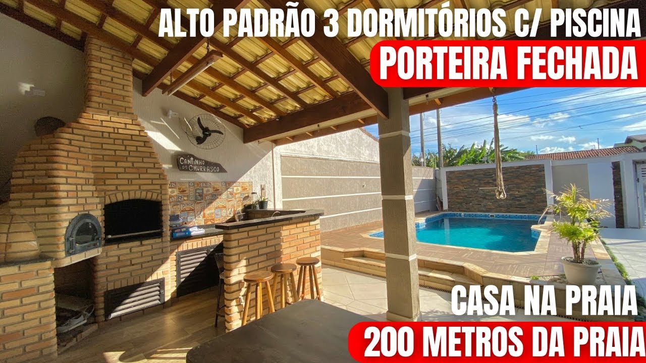 CASA ALTO PADRAO PORTEIRA FECHADA 3 DORMITORIOS COM PISCINA A VENDA EM ITANHAEM SP