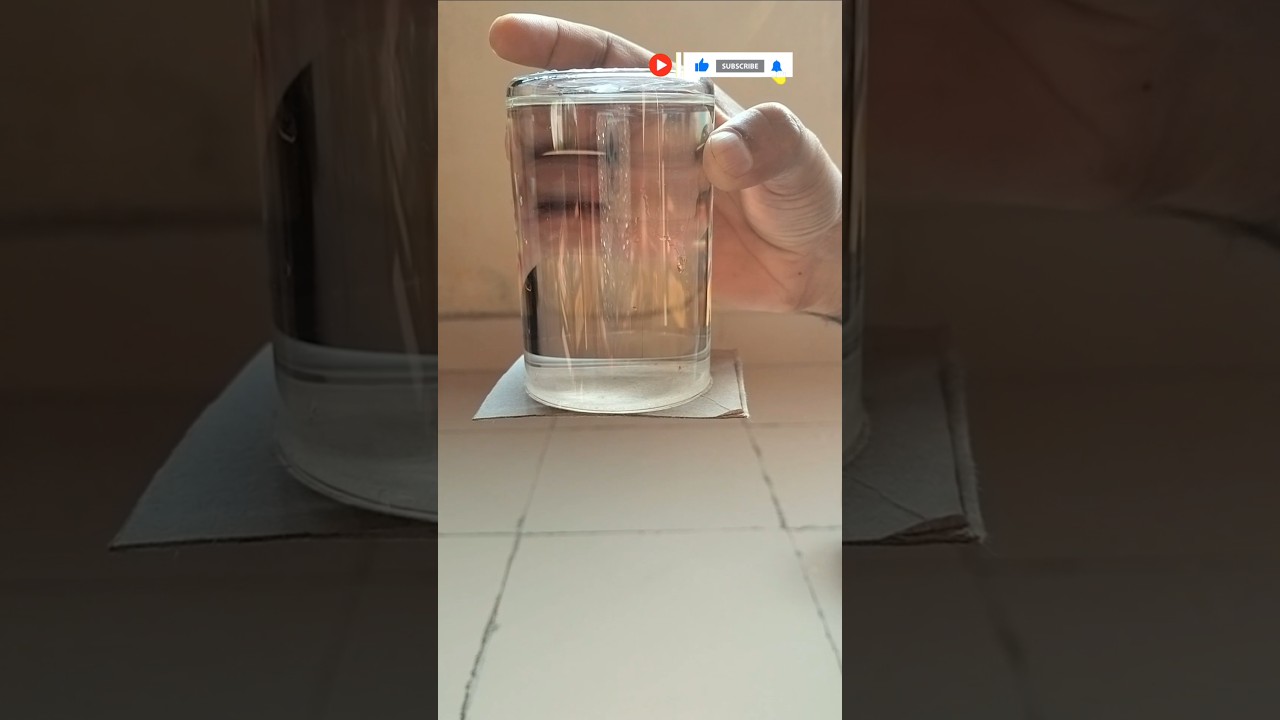 Atmospheric pressure experiment with glass of water#ytshorts