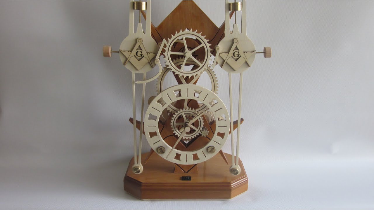 Masonic twin pendulum clock
