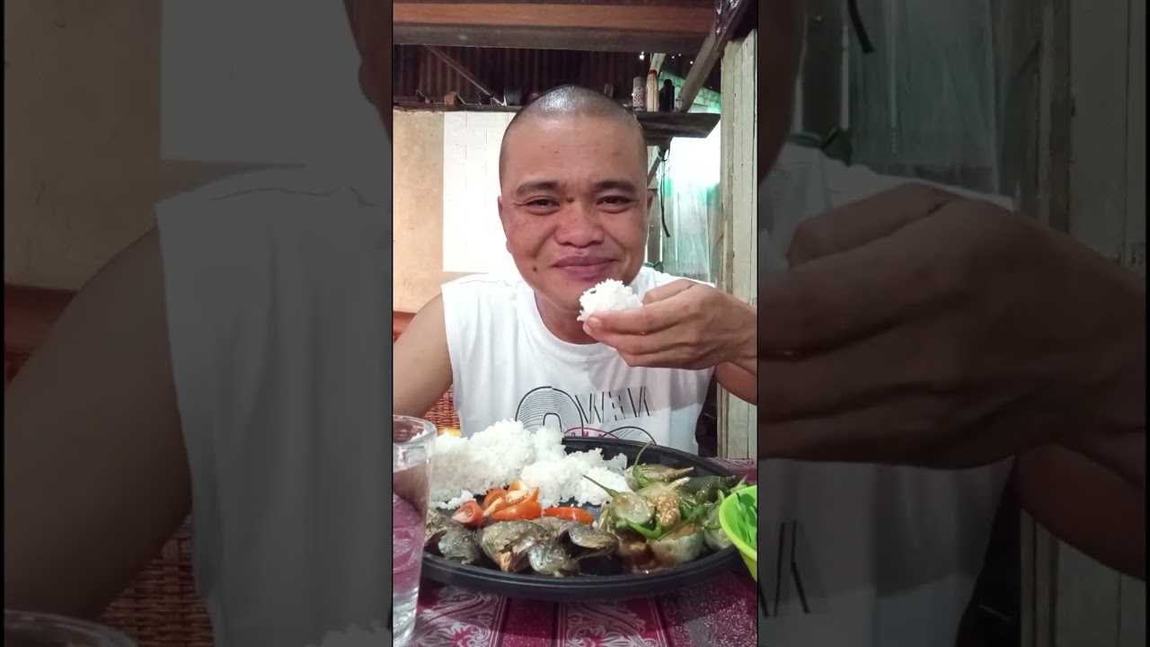 Sarap Ng talong, at pretong tilapia sa dayok