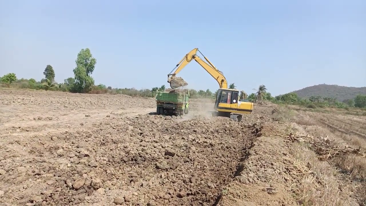 New Excavators Loading Overburden Cat 160H Grader in Huge Mine | Caterpillar & Liebherr - Ascon Ltd