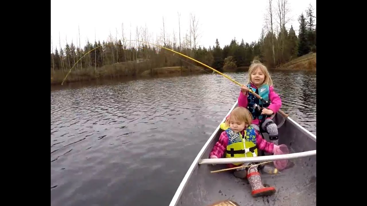 Cute Kids Catching Their First Fish