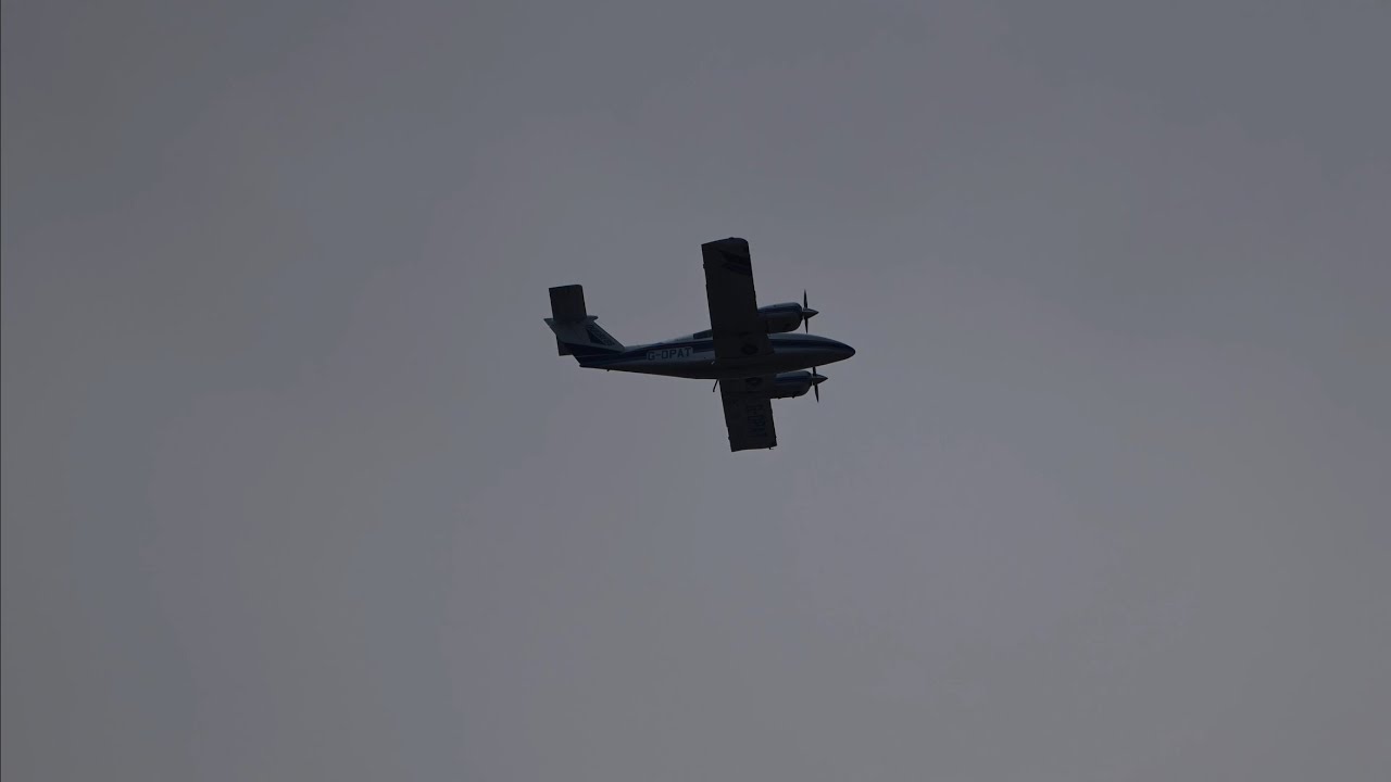 Private Beech 76 Duchess [G-OPAT] flying above my house