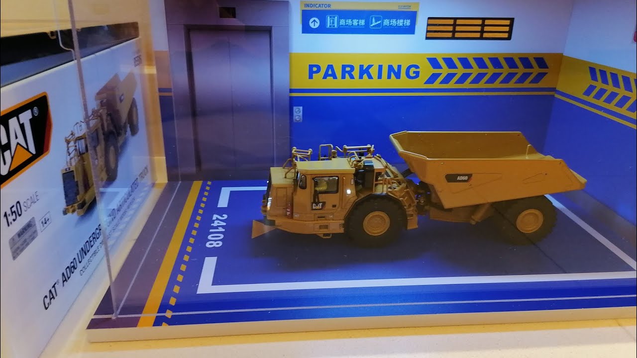 Unboxing Diecast Masters 85516 1:50 Caterpillar CAT AD60 Articulated Underground Dump Truck