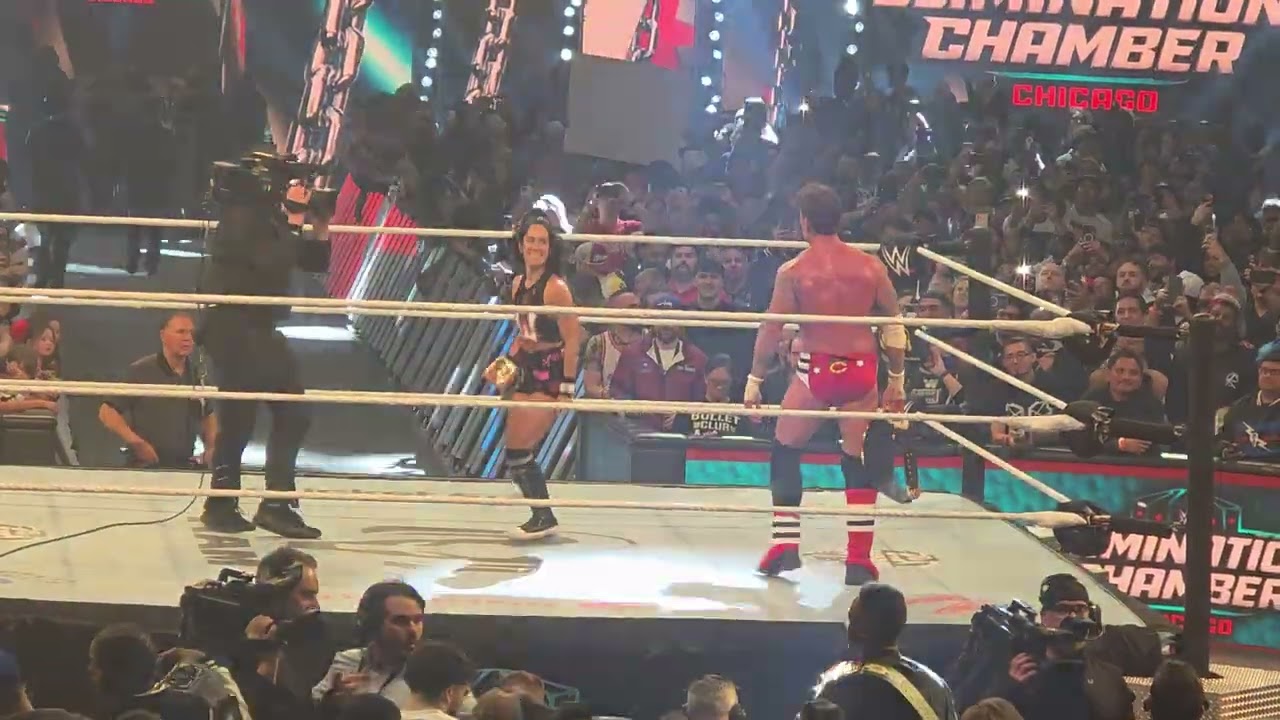AJ Lee comes back out to celebrate with CM Punk after his win at Elimination Chamber 2026