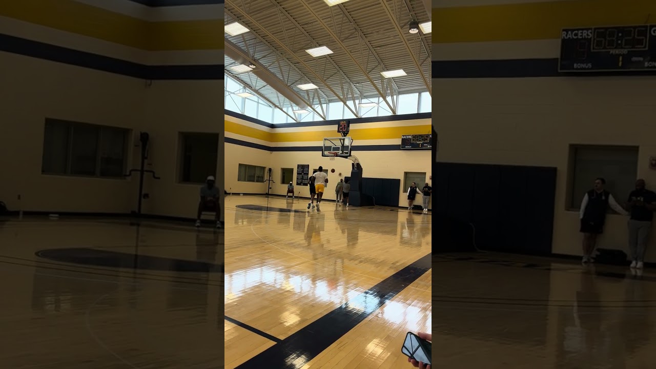Taylen Kinney in open gym with pass from Ja Morant