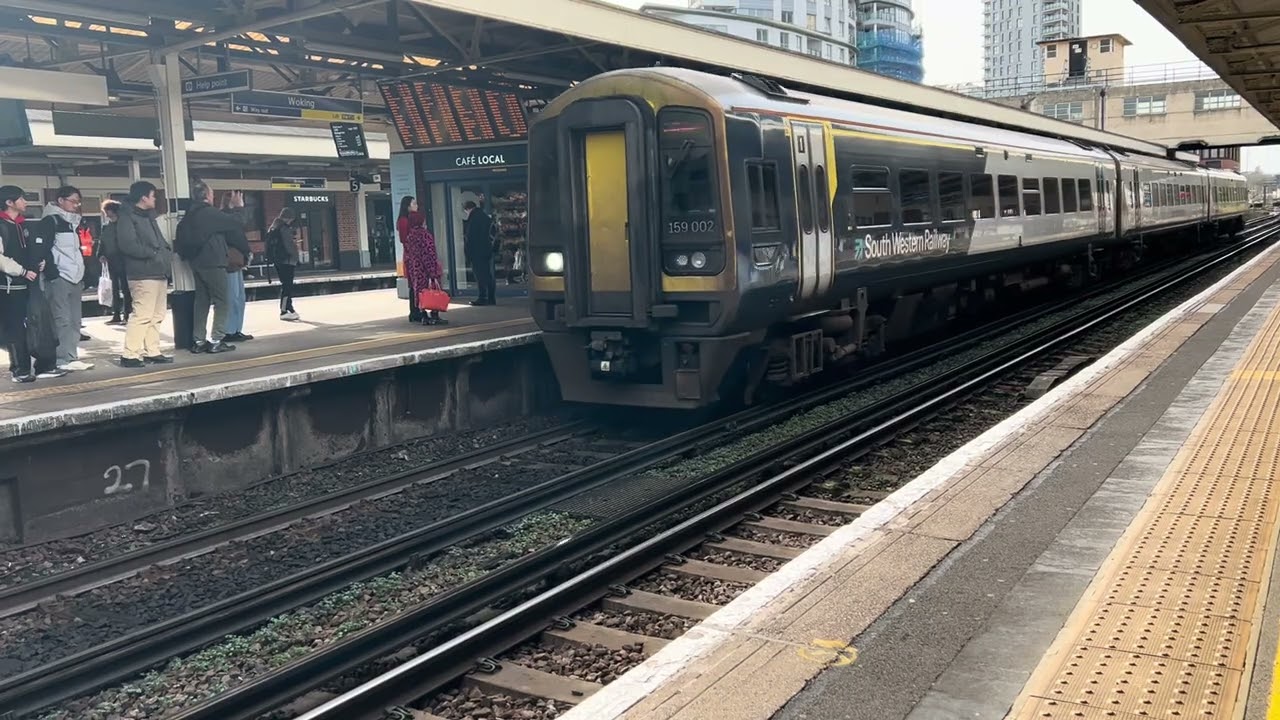SWR class 159002 arrives at Woking 