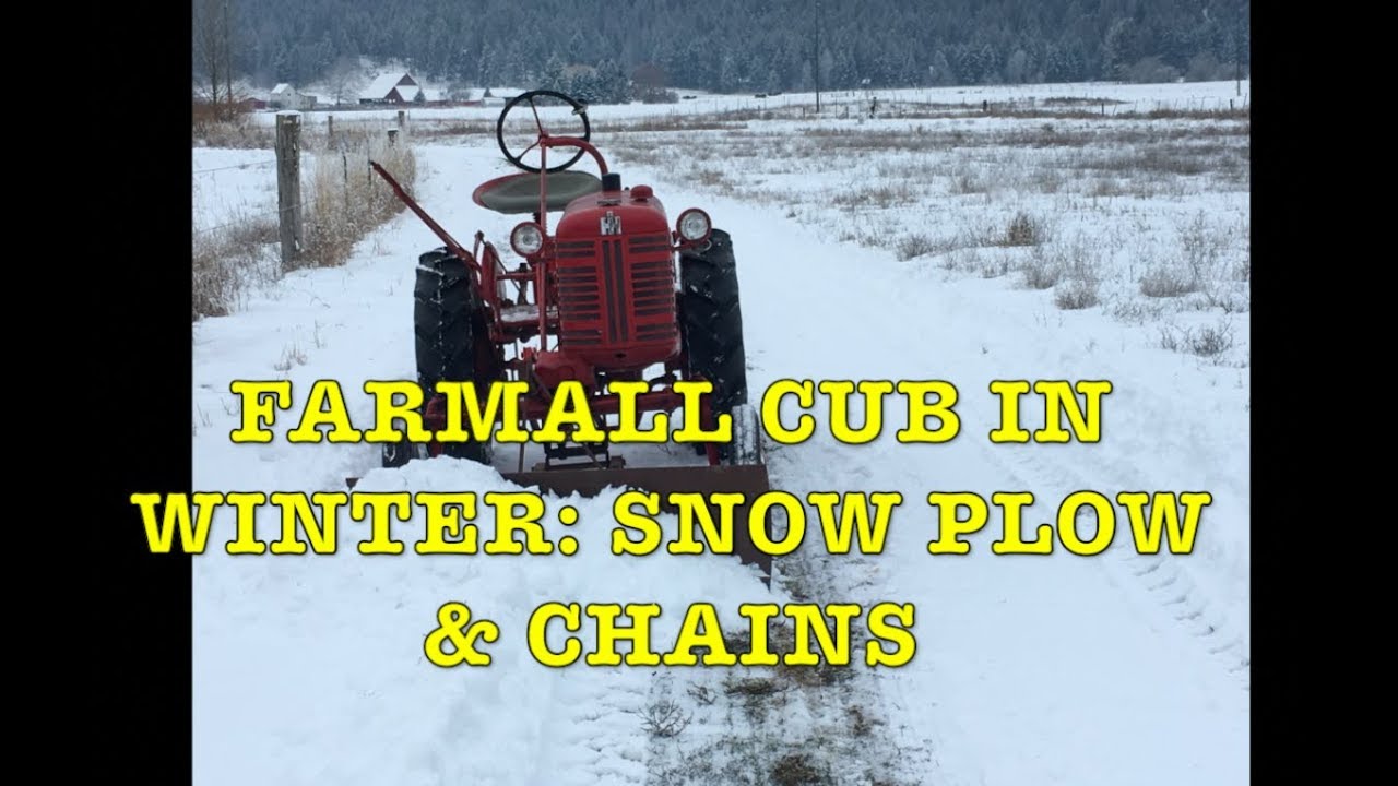 Farmall Cub: Putting on Snow Plow & Chains and Plowing Snow!