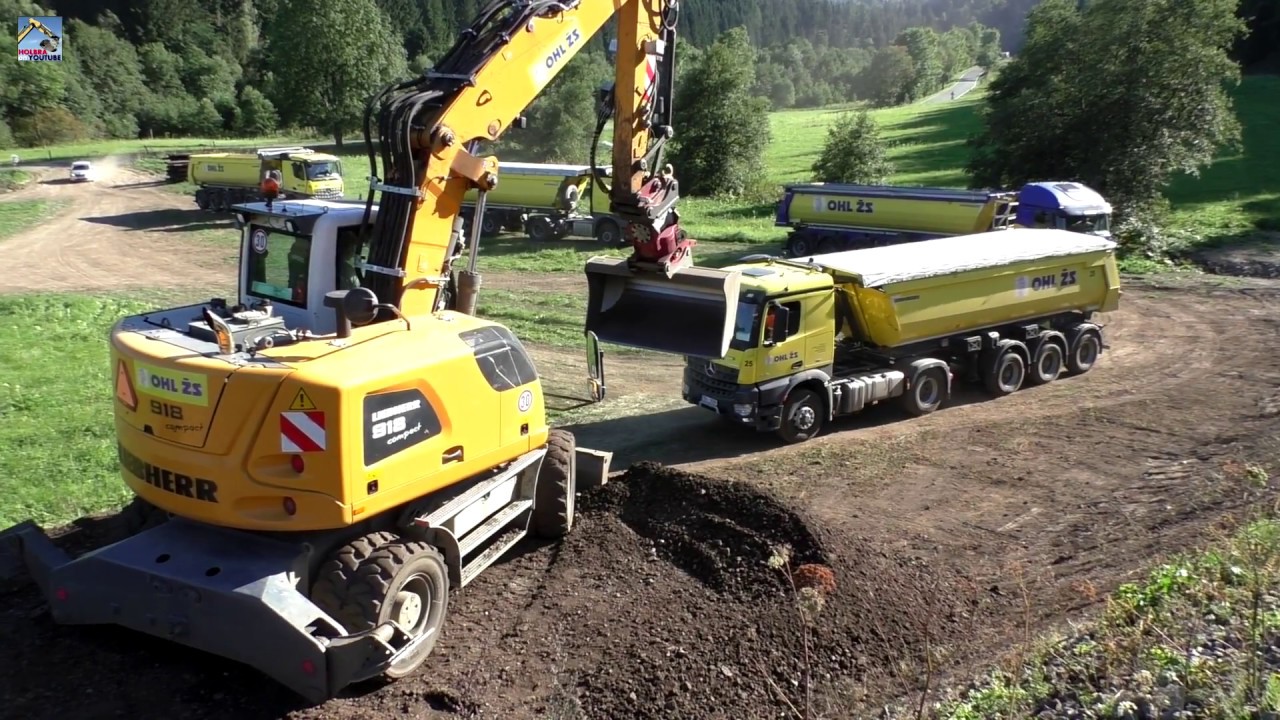 Liebherr 918 load Mercedes-Benz trucks