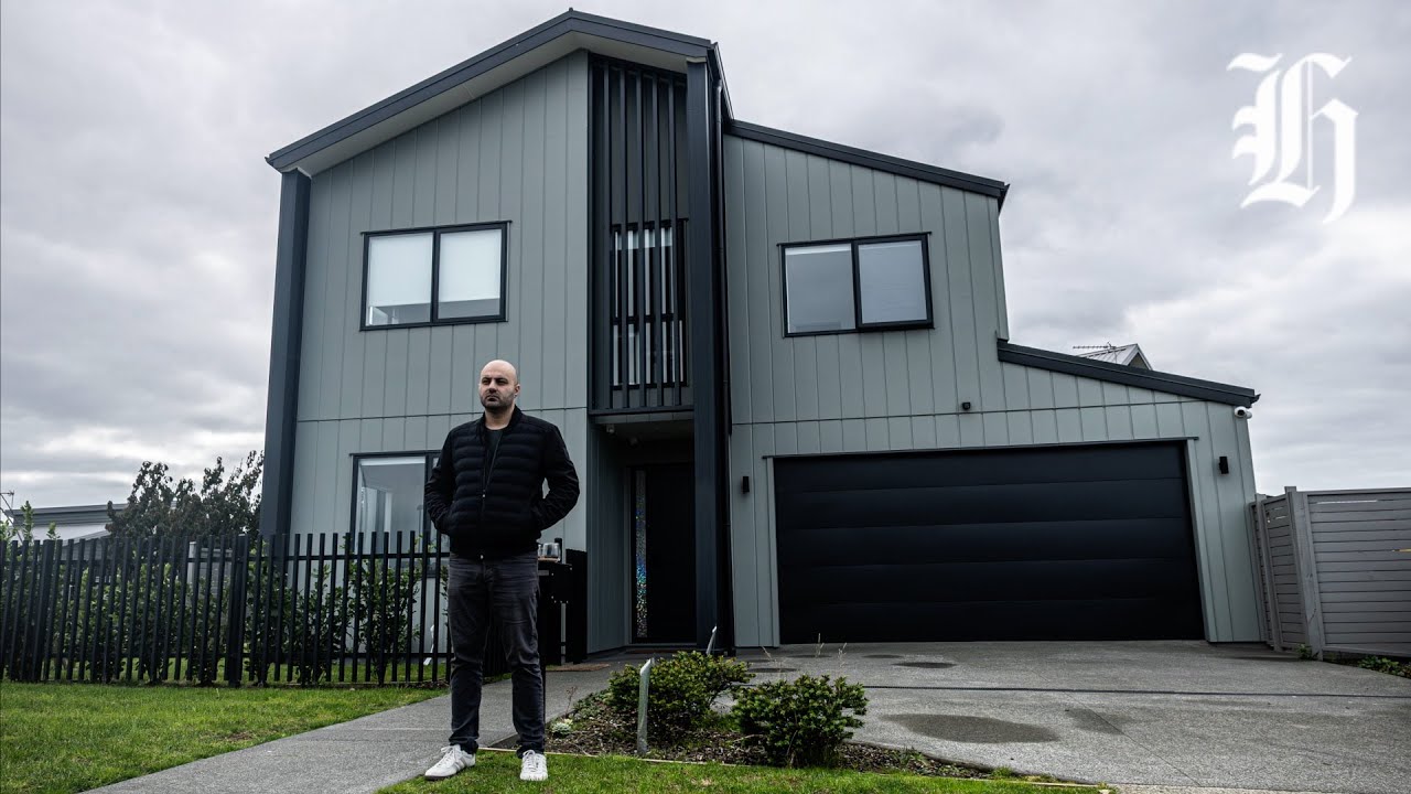 A Karaka homeowner says cladding on his new $1.27 million home makes “shotgun” sounds,