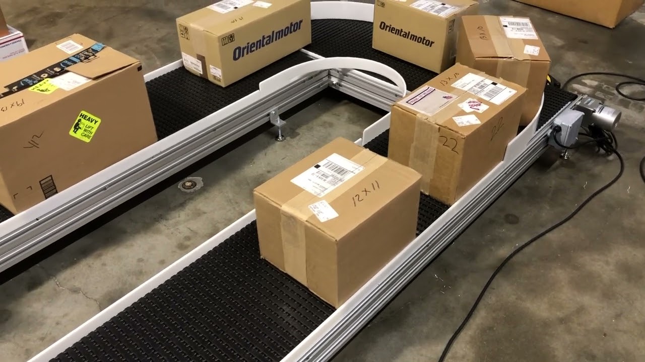 Carousel Conveyor System Moving Boxes for sorting or accumulation. #1