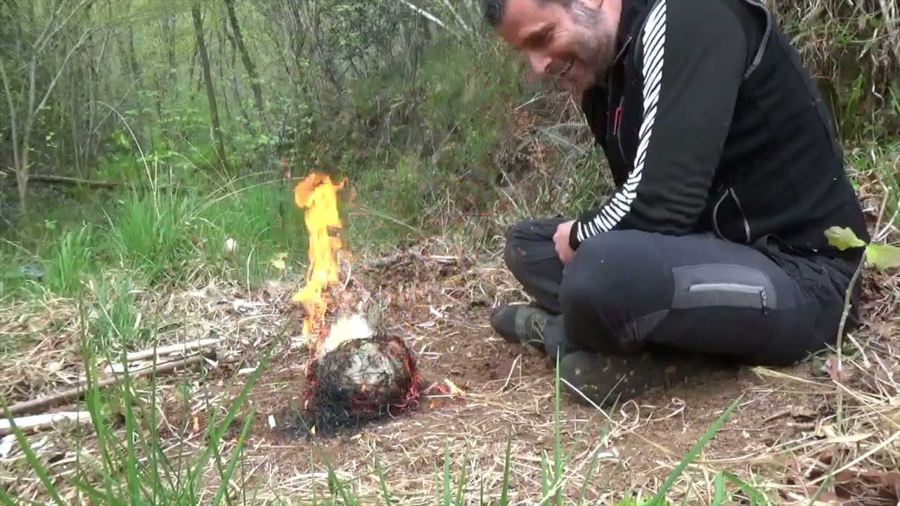 Bow drill fire kit with a Swiss Army knife | ESEE bow drill divot