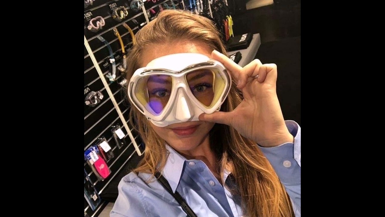 Crazy woman of 2027 in latex full face gas masks and scuba diving gear dresses