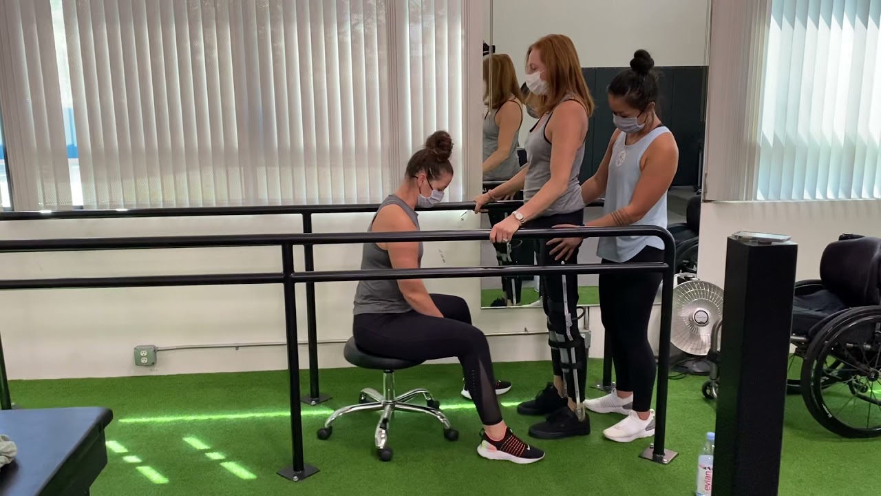 SCI- First steps with leg braces, T4 spinal cord injury . Video 1
