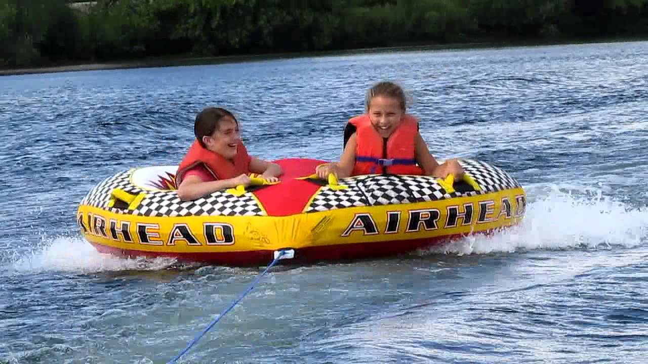Tubing behind boat at Fife Lake
