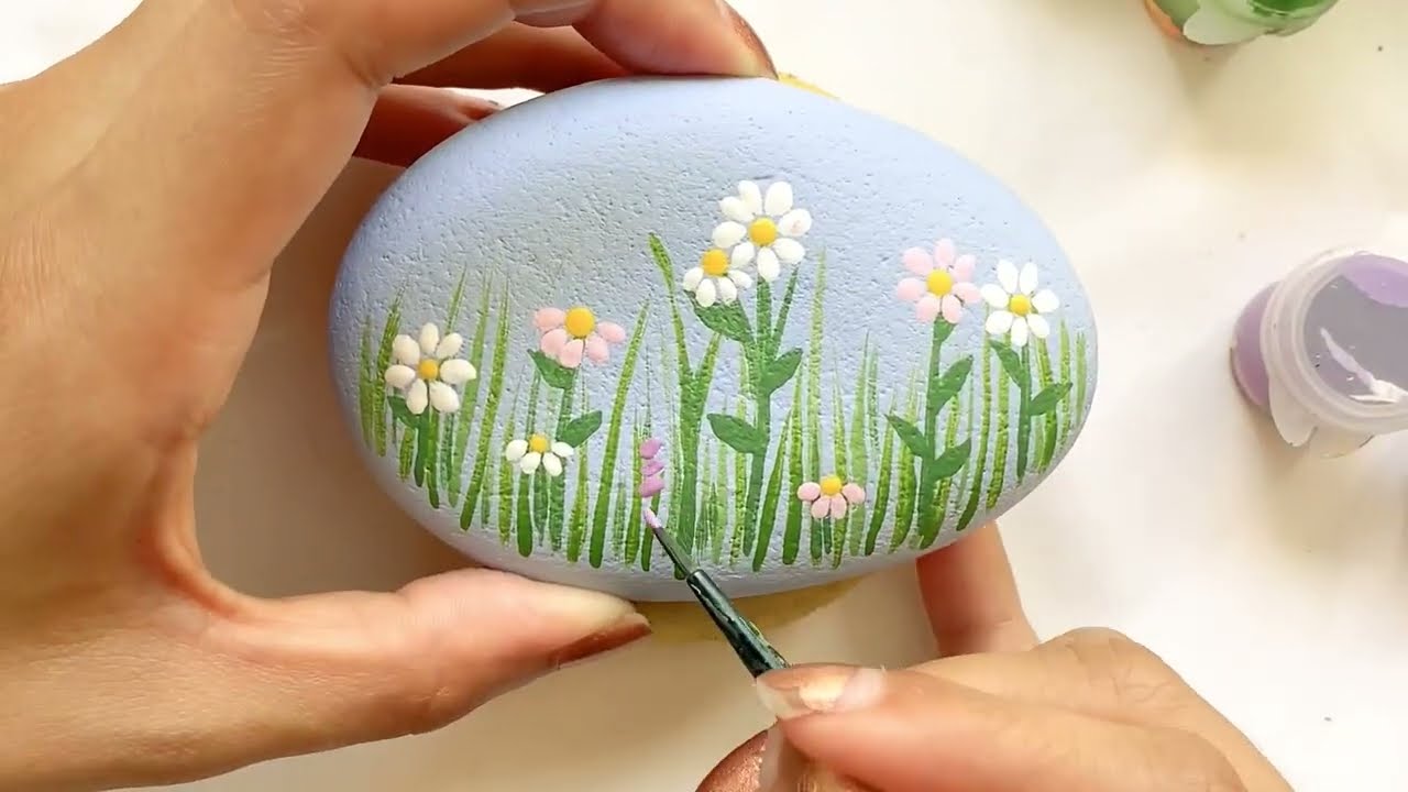 Painted flora on a rock using Rock Paint