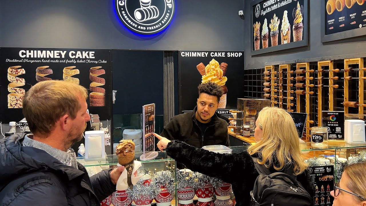 Street food in Budapest, Hungary. Chimney cake is the most popular street food in Budapest!