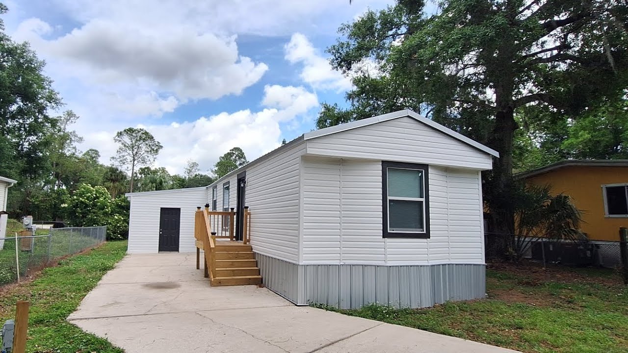 Se Vende Mobile Home de 2 Dormitorios 2 Baños con Terreno Incluido en Kissimmee, Florida 34746