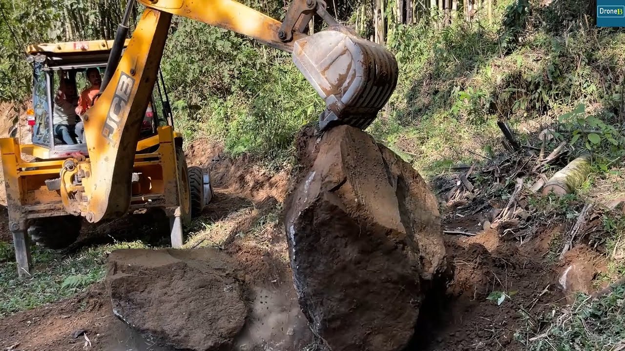 Clearing Logs and Making a Narrow Road Turn-JCB Backhoe