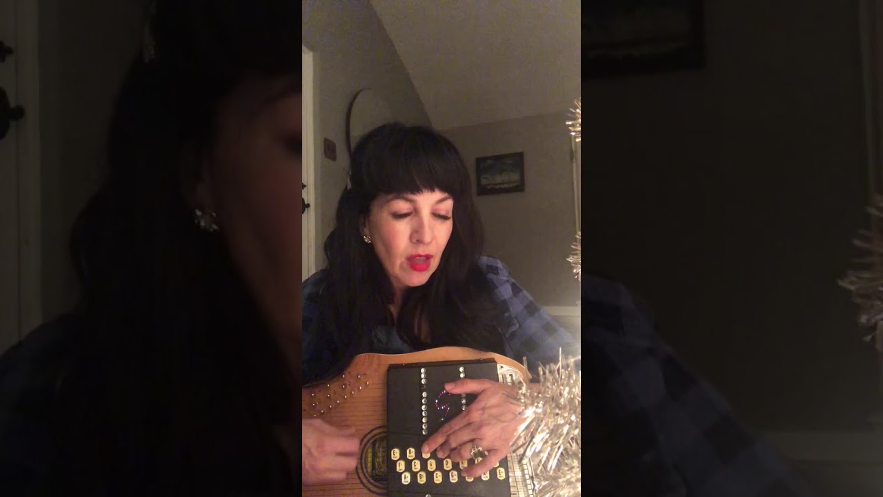 Grey Griffin sings 