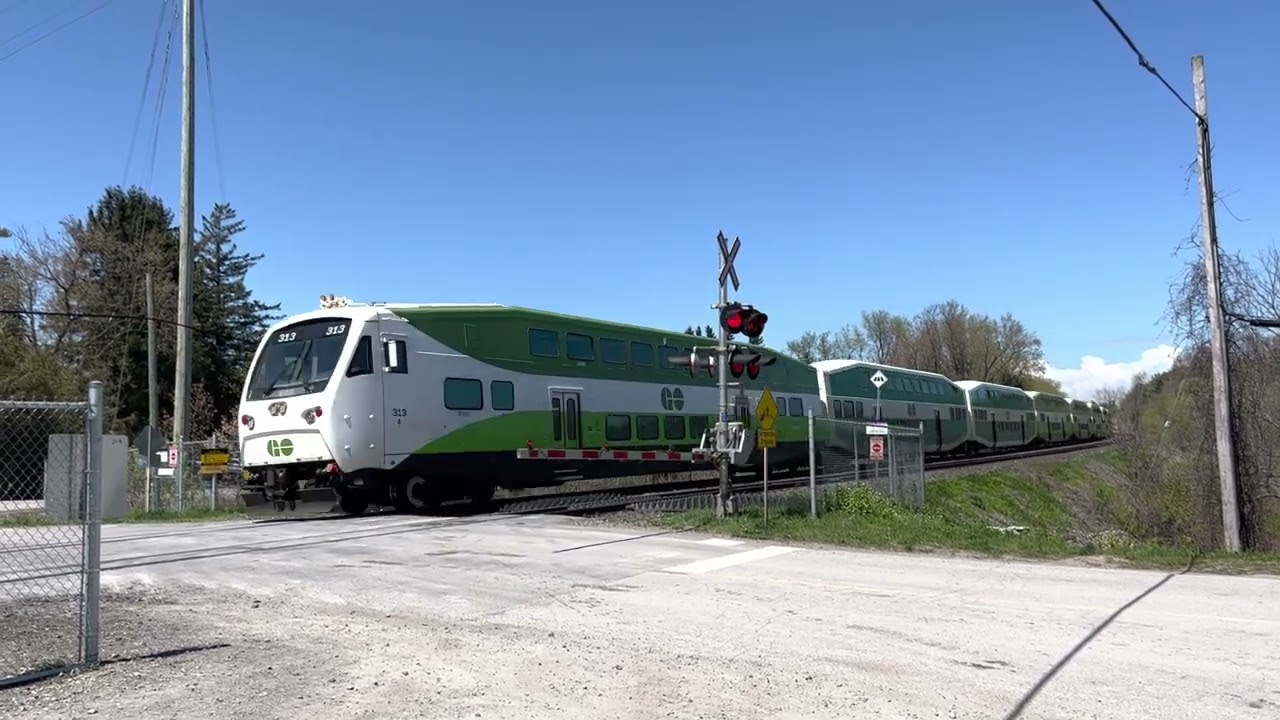 GO Transit Lakeshore East Line passing the railroad crossing at Rodd Ave, Pickering, ON