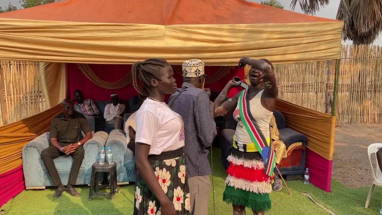Berbuk Matur Meen Giving his remarks during the Welcoming ceremony of Grace Achien Bagic.