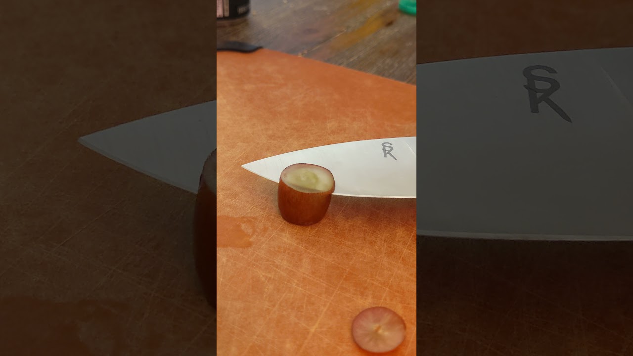 SPK Shark in Vanax cutting through a grape 🍇