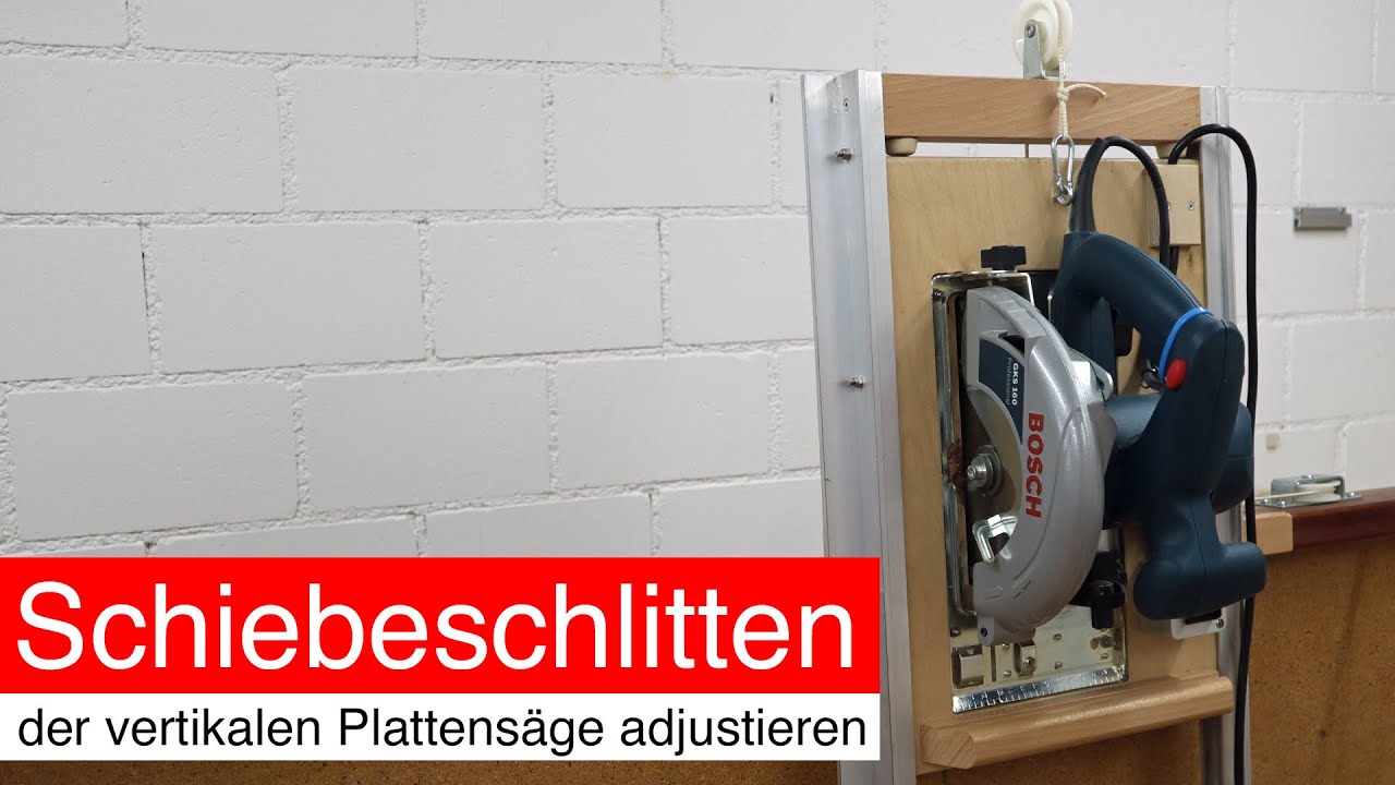 Schiebeschlitten der vertikalen Plattensäge adjustieren