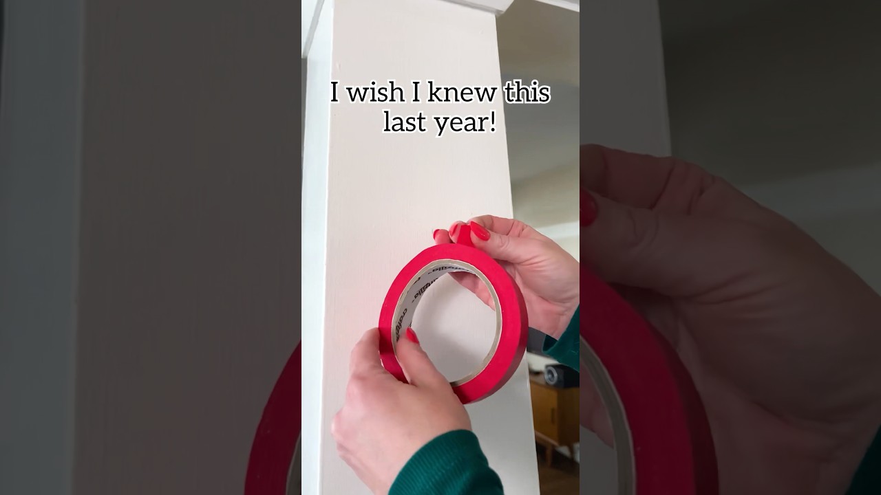 Use command hooks with painters tape to secure decorations & protect your walls! #garland #newyear