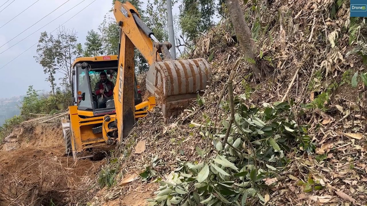 Rocks and Tree Roots-Excavation for New Wide Mountain Road Track