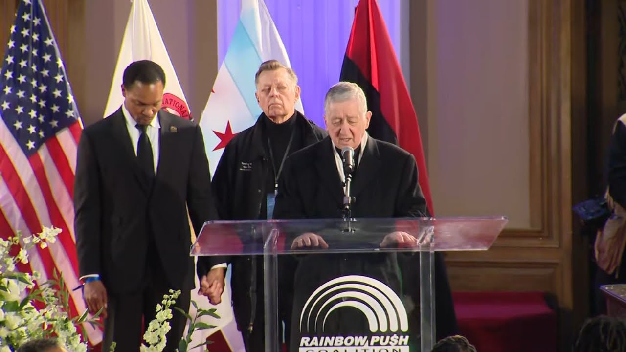 Cardinal Blase Cupich leads prayer at Rev. Jackson’s visitation