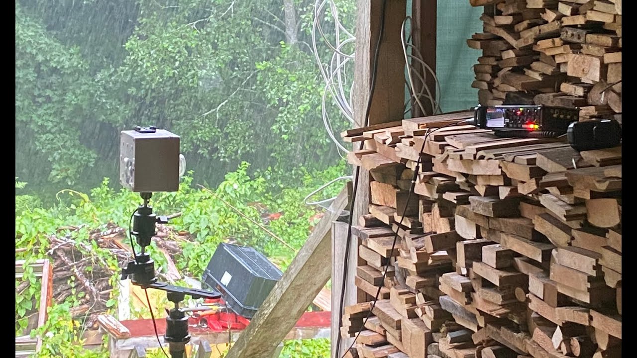 Passing thunderstorm under a tin roof.