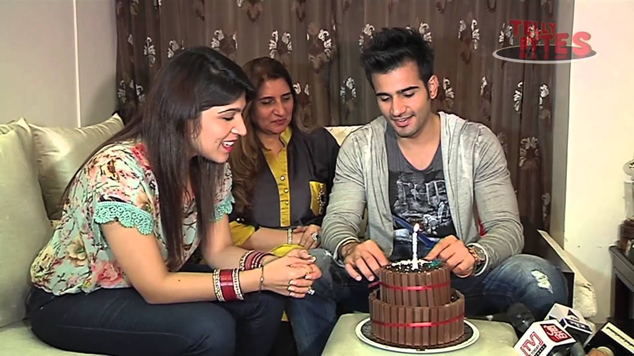 Karan's sister Sasha Tacker bakes a cake for the birthday boy