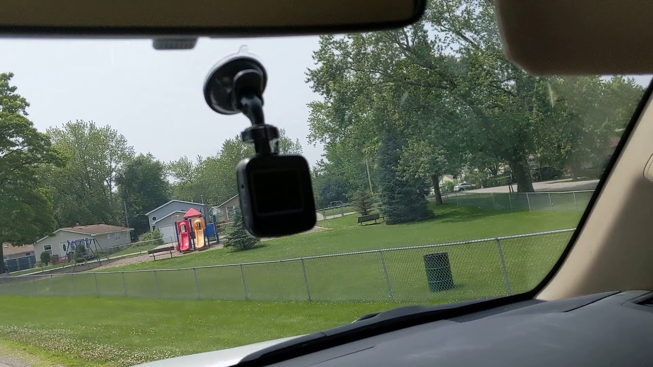 Driving thru round lake beach in old neighborhood