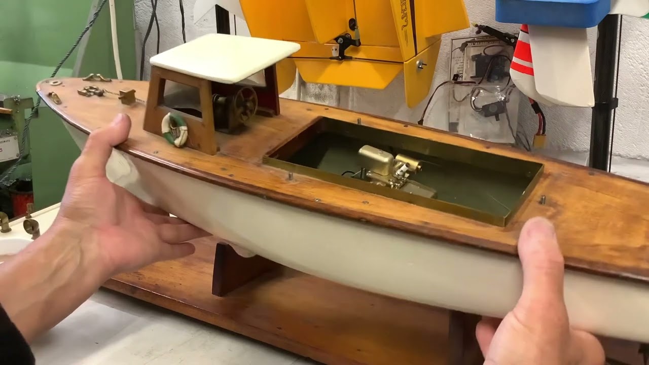 Vintage RC boat, with gasoline spark ignition engine