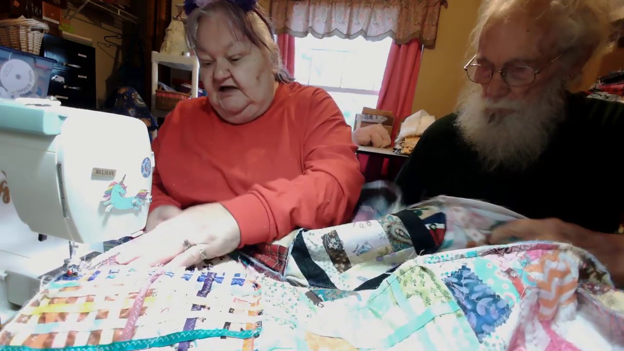Papa helping me get this quilt sewn together