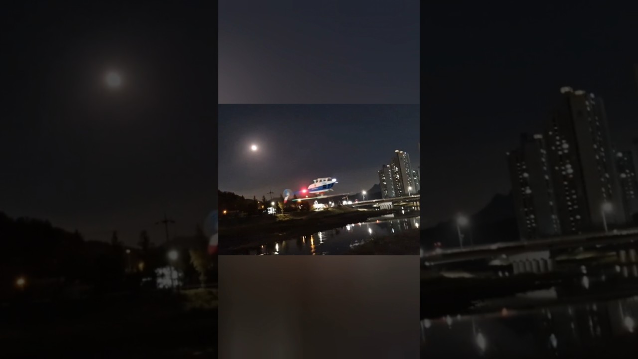 RC ERA C138 Pro Bell206 flying against the backdrop of the super full moon in the night