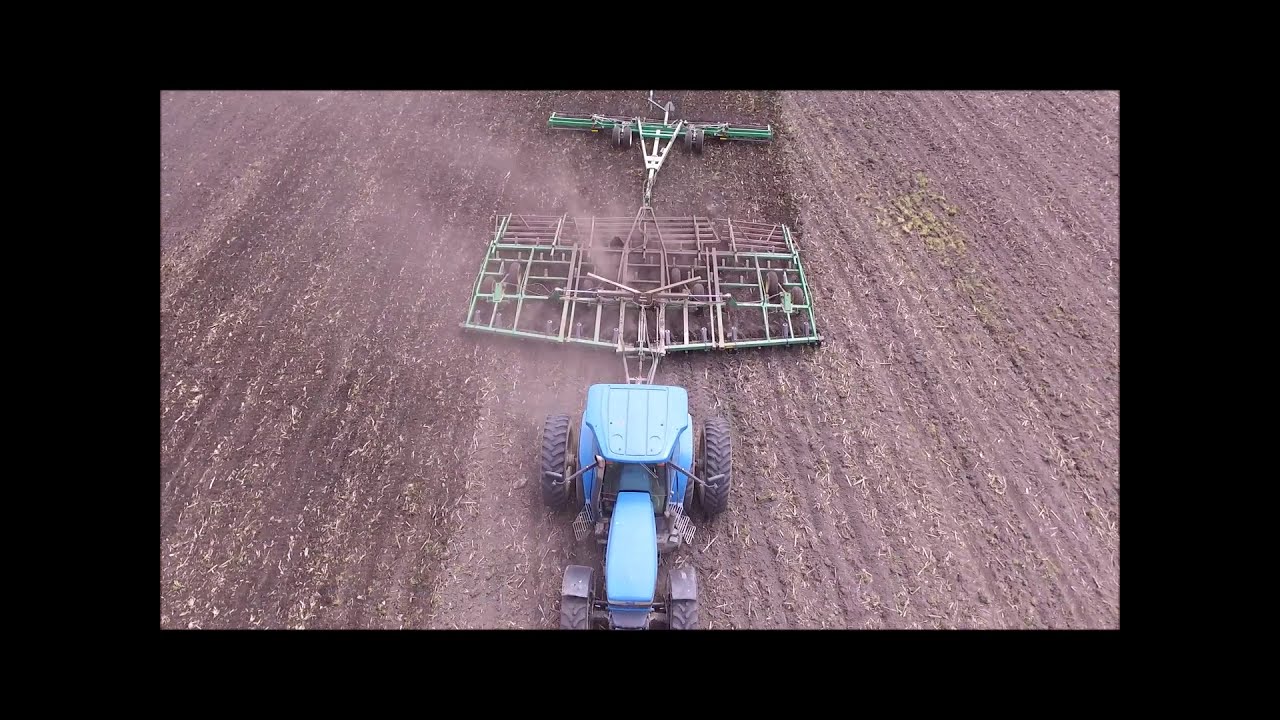 Ford 8970 with John Deere 726 Soil Finisher and Unverferth rolling harrow spring tillage