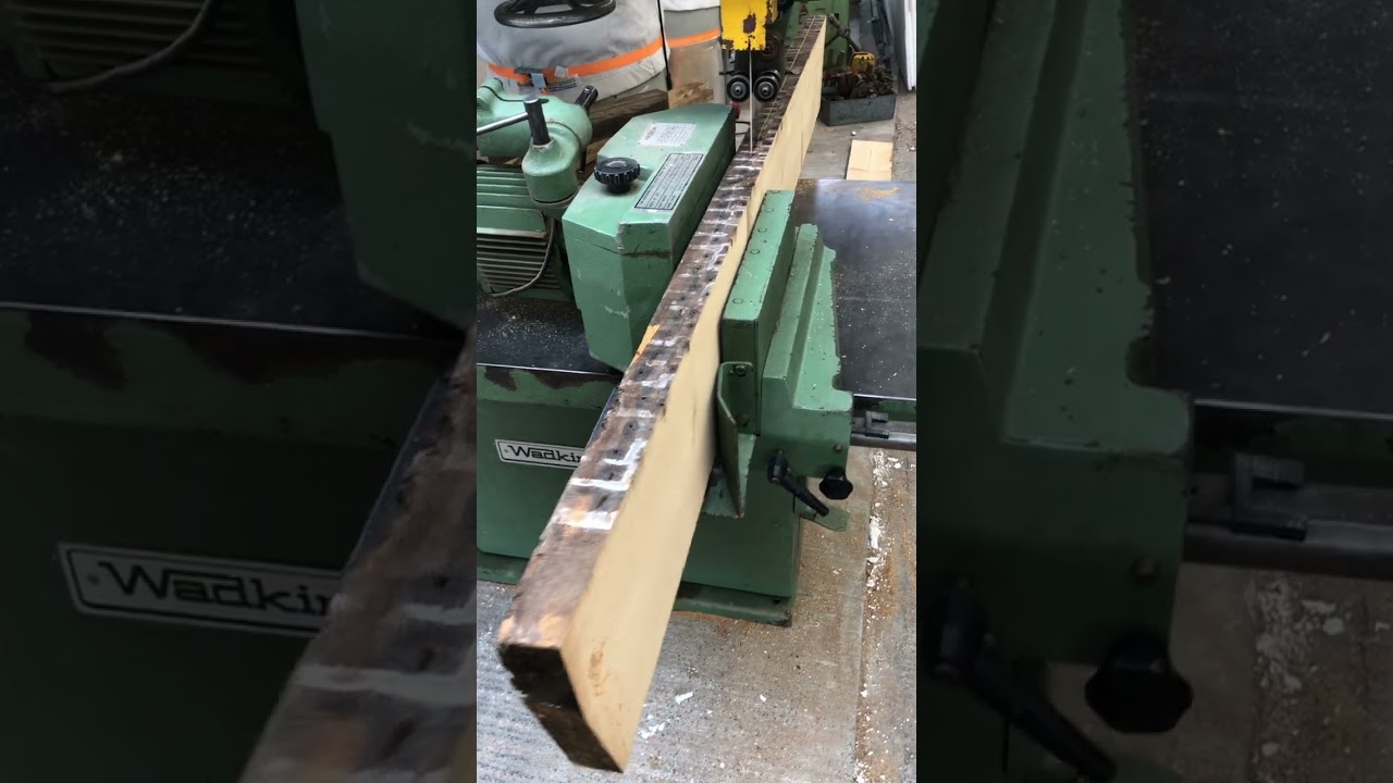 Resawing reclaimed pine joists into pine flooring on Wadkin PBR Resaw