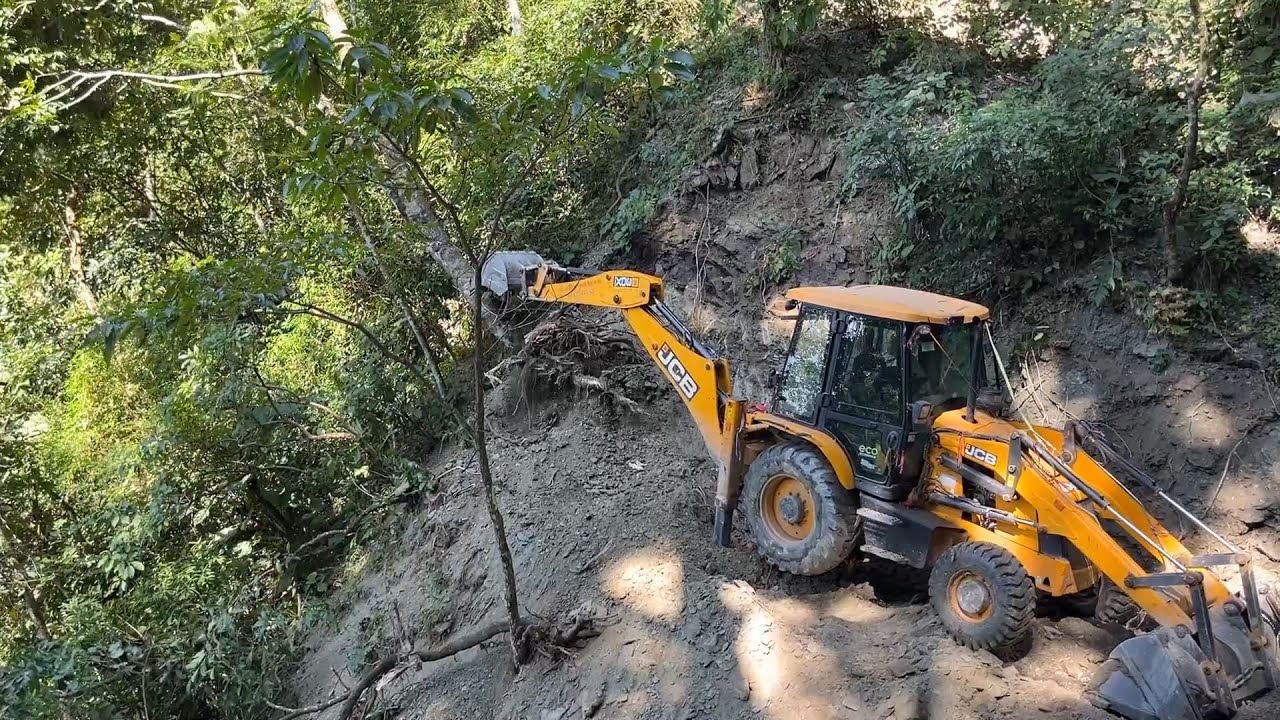 Slow and Steady Work Results in Steep Mountain Forest Road