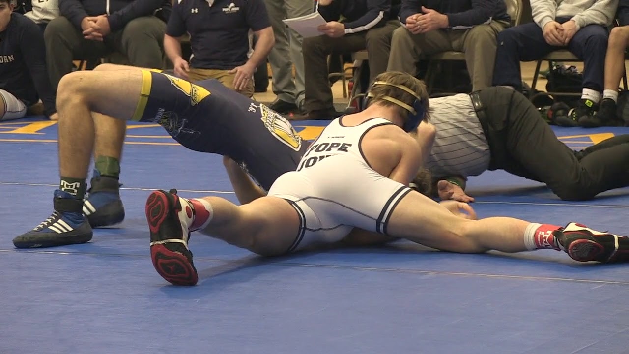 JoJo Aragona of Pope John pins Patrick Newman of Holy Spirit at 145 pounds