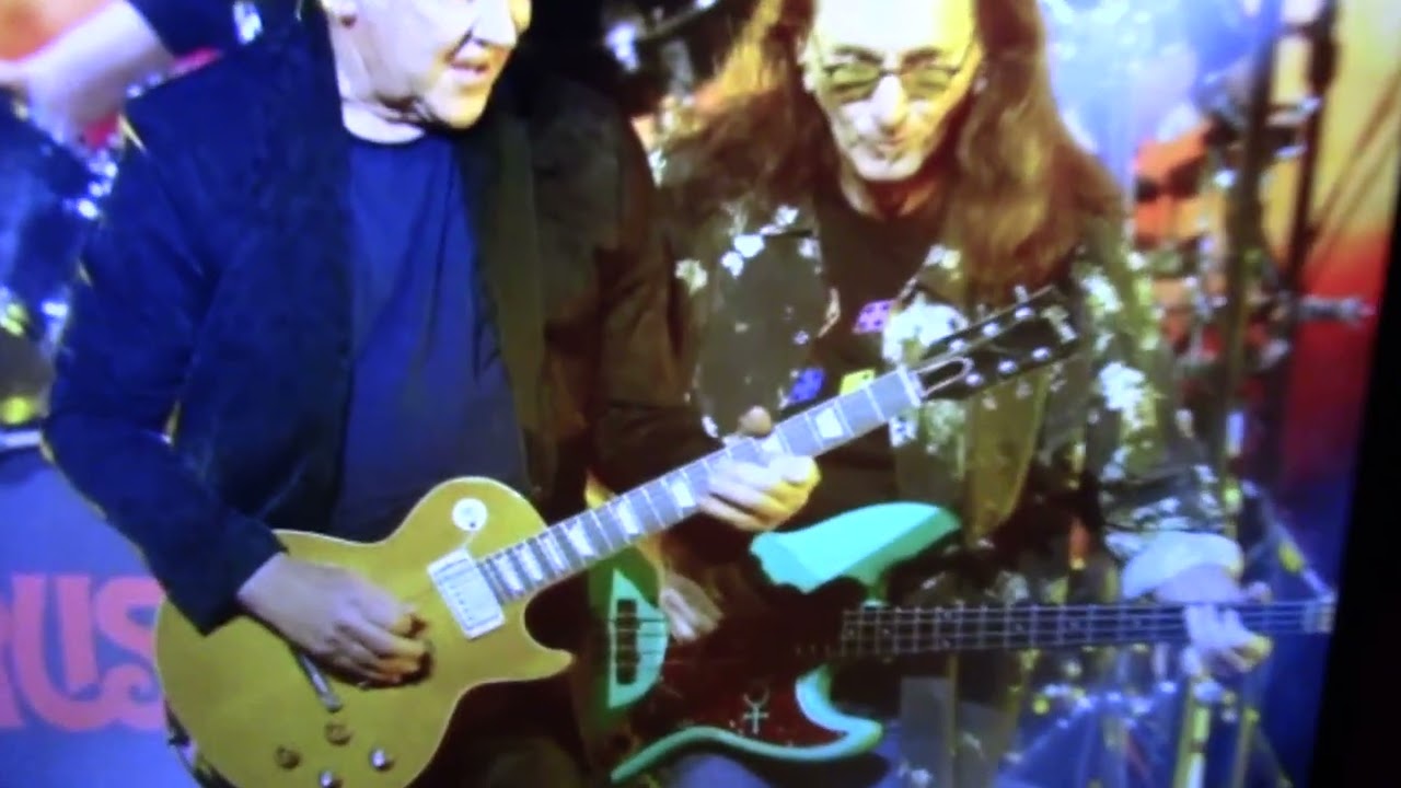 Выступление Rush на церемонии вручения премии Juno Awards 2026: посмотрите на гитару Les Paul Але...