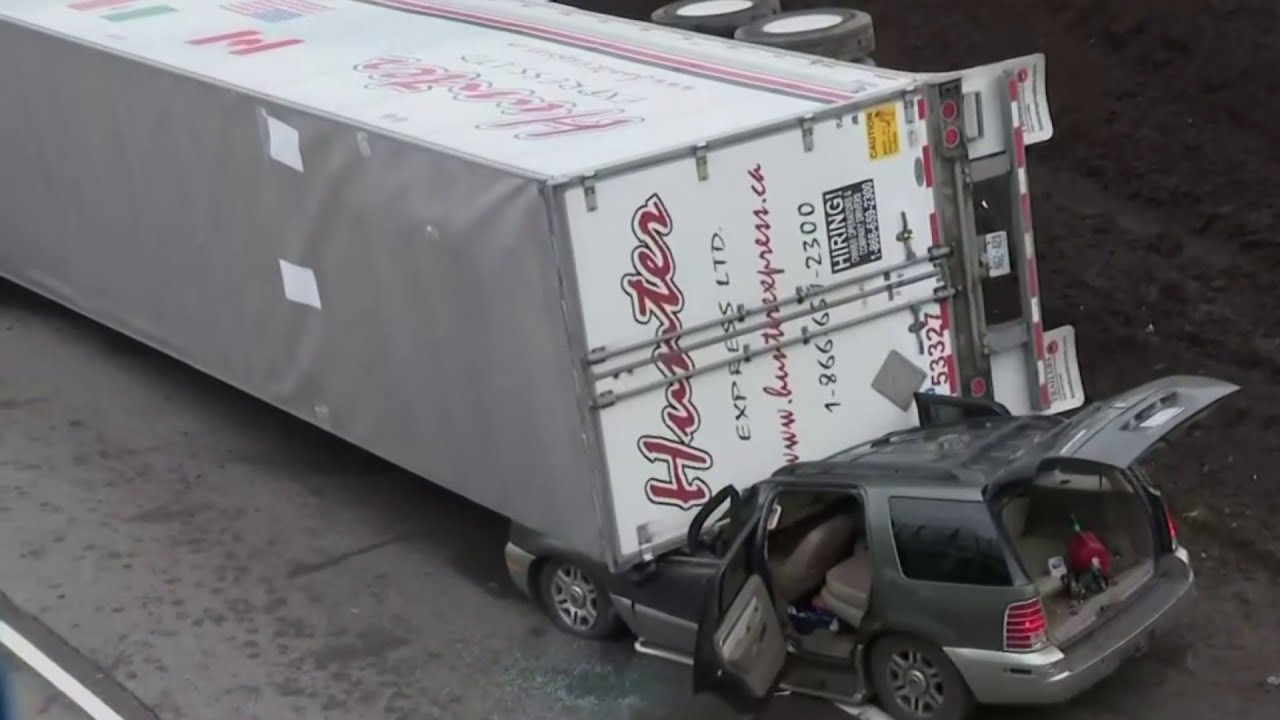 Two drivers injured after semi truck rollover crash in Detroit