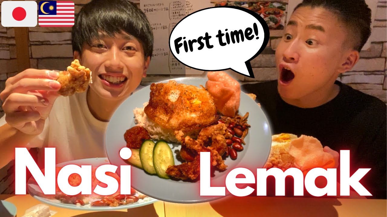 Japanese boys eat &rdquo;Nasi lemak&rdquo; at the first time.