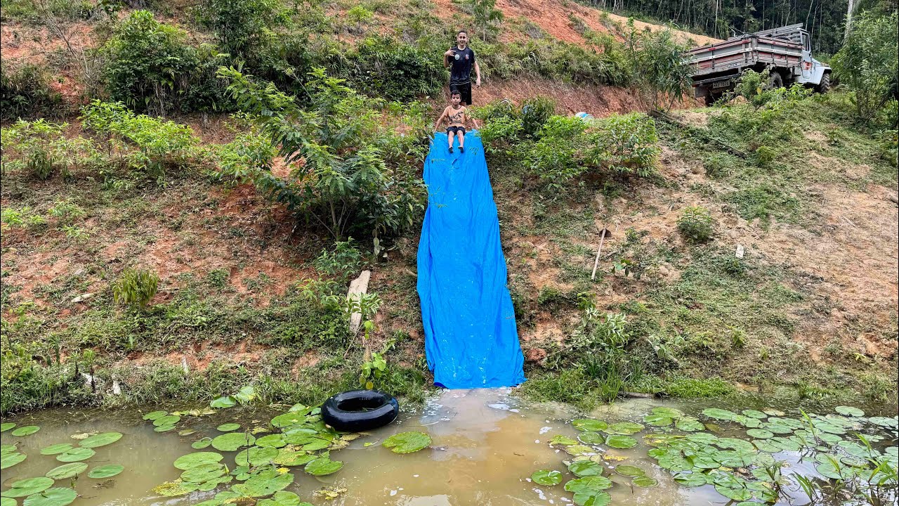 FIZEMOS UM ESCORREGADOR PARA CAIR NO LAGO. Thiago velho