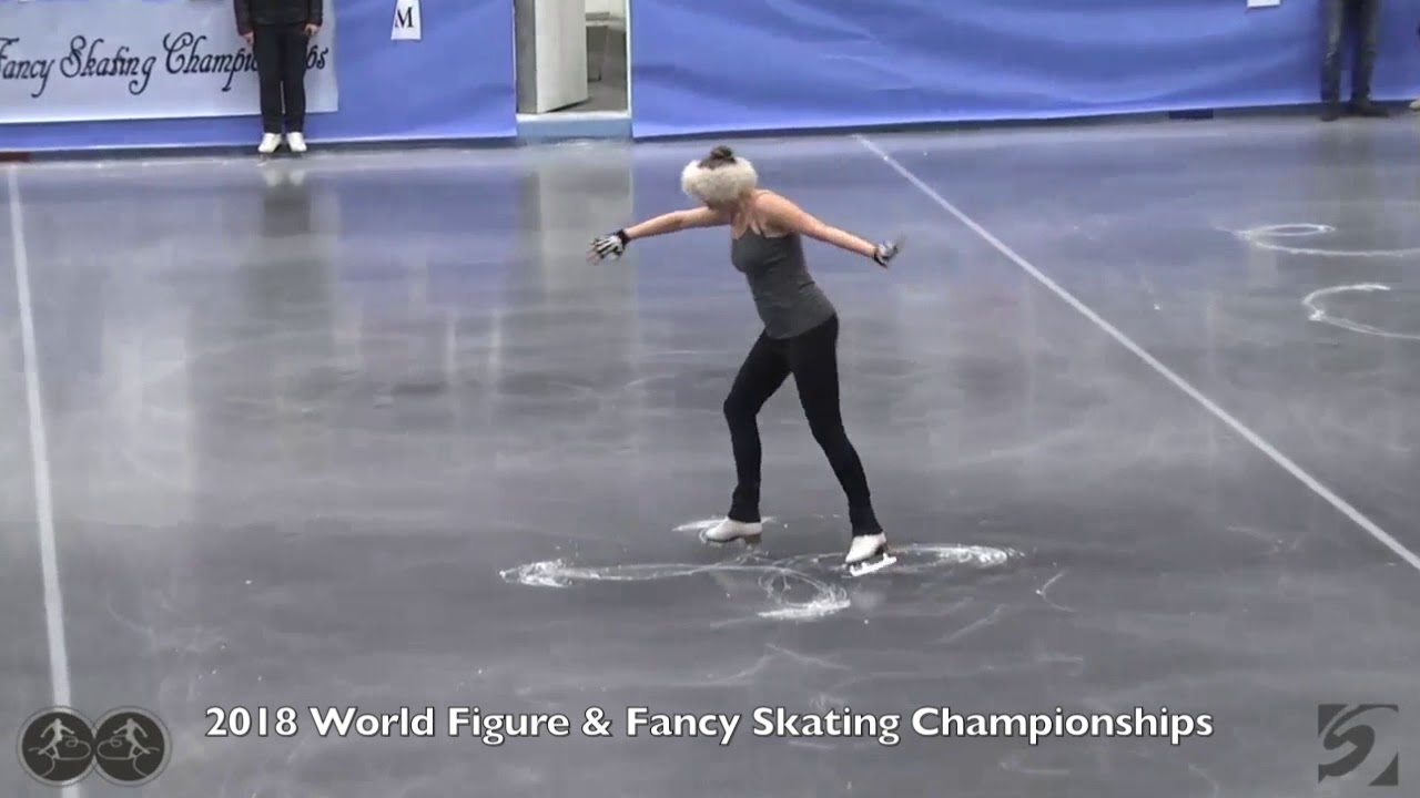 B. Pitman & L. Elmore compete the Maltese Cross in the 2018 World Figure Championship